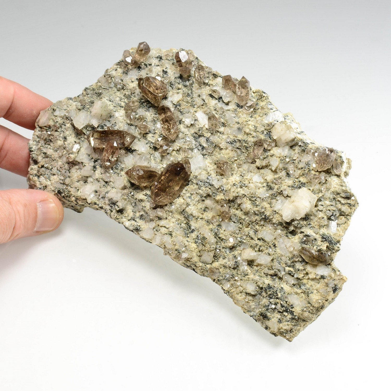 Smoky quartz, adularia and asbestos - Switzerland