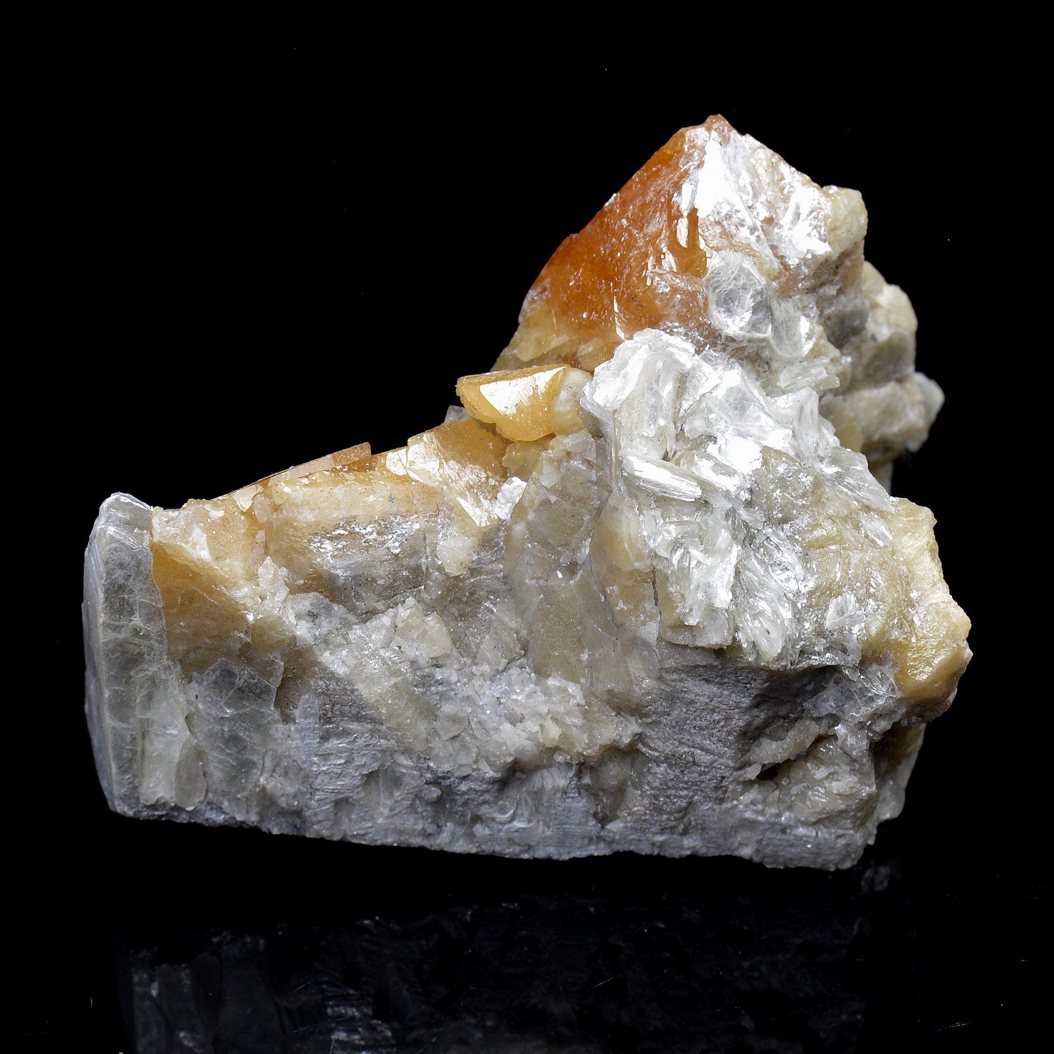 Scheelite on muscovite – Xuebaoding Mountains, Pingwu, Sichuan Province, China Scheelite on muscovite – Xuebaoding Mountains, Pingwu, Sichuan Province, China