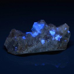 Scheelite and calcite on muscovite - Xuebaoding Mts, Pingwu, Sichuan Prov., China